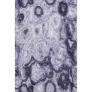 Photo of Purple And Ivory Abstract Washable Area Rug With UV Protection