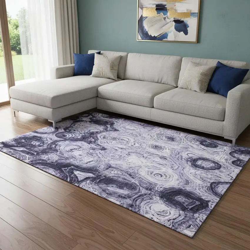 Purple And Ivory Abstract Washable Area Rug With UV Protection Photo 1