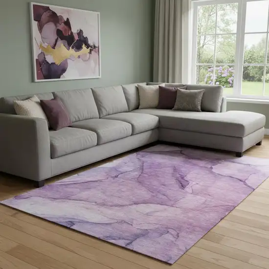 Purple And Ivory Abstract Washable Area Rug With UV Protection Photo 1