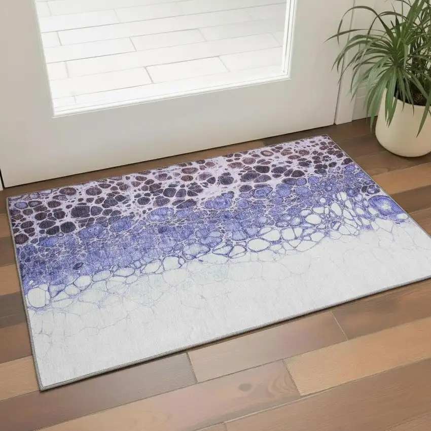 Purple And Ivory Abstract Washable Area Rug With UV Protection Photo 1
