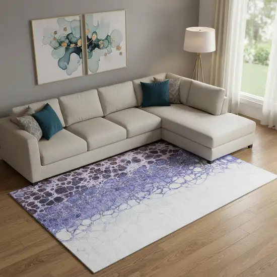 Purple And Ivory Abstract Washable Area Rug With UV Protection Photo 1