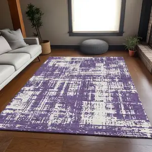 Photo of Purple And Ivory Abstract Washable Area Rug With UV Protection