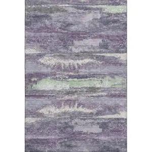 Photo of Purple And Ivory Abstract Washable Area Rug With UV Protection