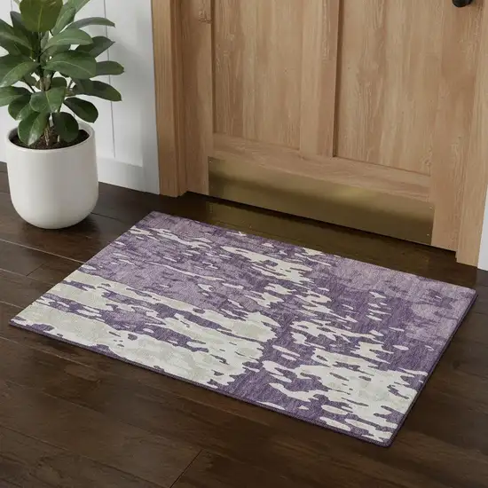 Purple And Ivory Abstract Washable Area Rug With UV Protection Photo 1