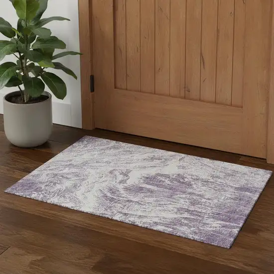 Purple And Ivory Abstract Washable Area Rug With UV Protection Photo 1
