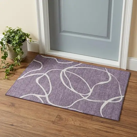 Purple And Ivory Abstract Washable Area Rug With UV Protection Photo 1