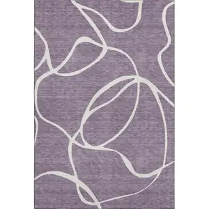 Photo of Purple And Ivory Abstract Washable Area Rug With UV Protection