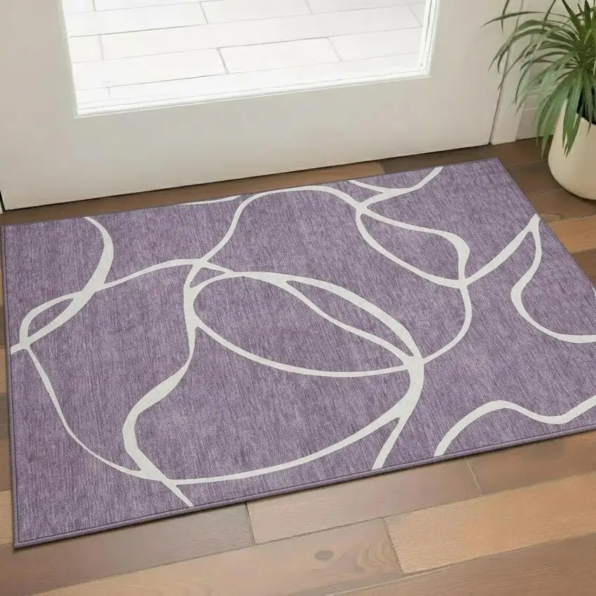 Purple And Ivory Abstract Washable Area Rug With UV Protection Photo 2
