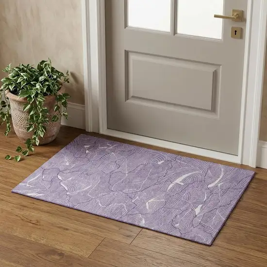 Purple And Ivory Abstract Washable Area Rug With UV Protection Photo 1
