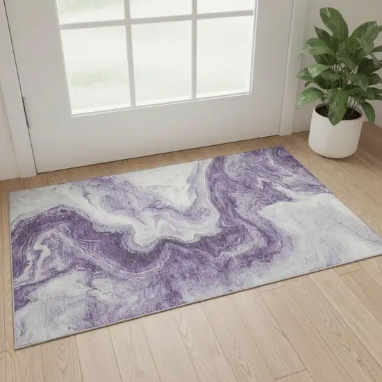 Purple And Ivory Abstract Washable Area Rug With UV Protection Photo 2