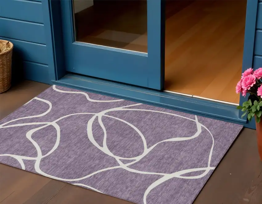 Purple And Ivory Abstract Washable Indoor Outdoor Area Rug Photo 1