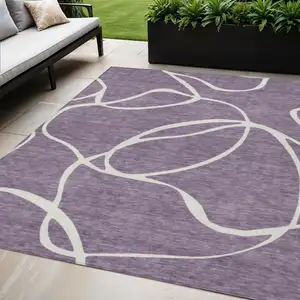 Photo of Purple And Ivory Abstract Washable Indoor Outdoor Area Rug