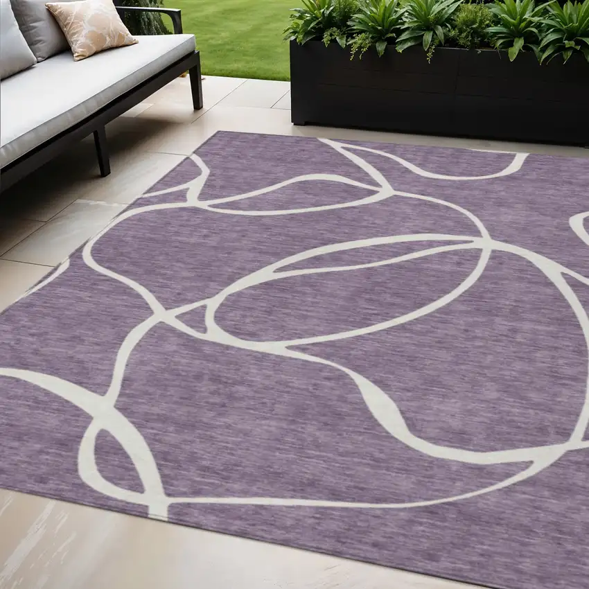 Purple And Ivory Abstract Washable Indoor Outdoor Area Rug Photo 1