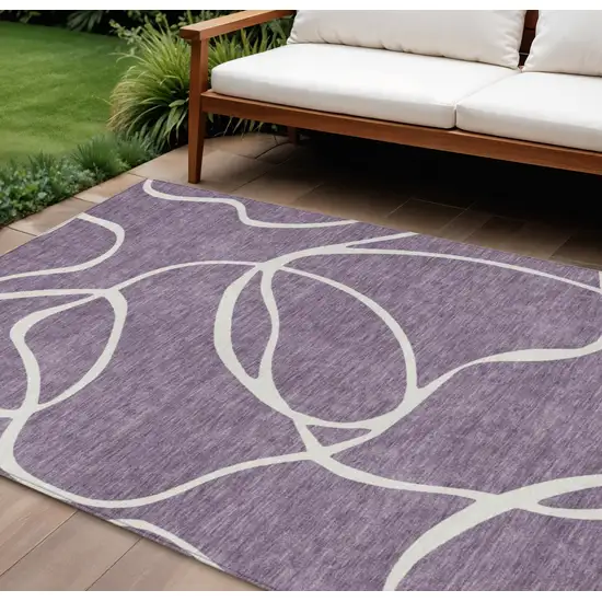 Purple And Ivory Abstract Washable Indoor Outdoor Area Rug Photo 1