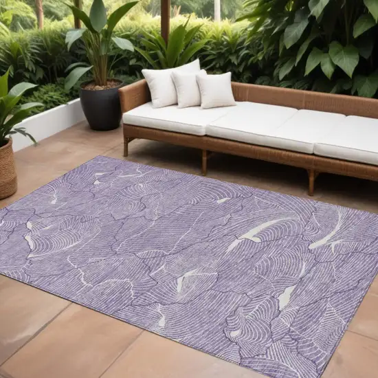 Purple And Ivory Abstract Washable Indoor Outdoor Area Rug Photo 1
