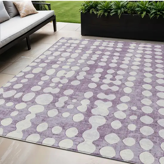 Purple And Ivory Abstract Washable Indoor Outdoor Area Rug Photo 1