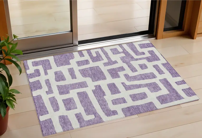 Purple And Ivory Abstract Washable Indoor Outdoor Area Rug Photo 1