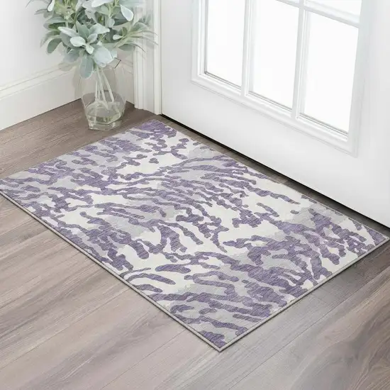 Purple And Ivory Animal Print Washable Area Rug With UV Protection Photo 2