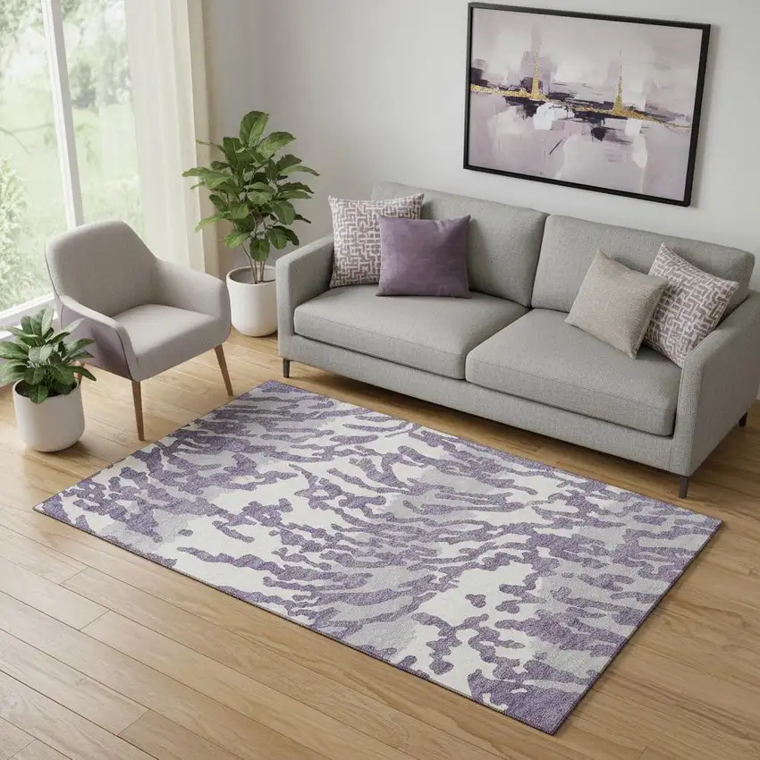 Purple And Ivory Animal Print Washable Area Rug With UV Protection Photo 1