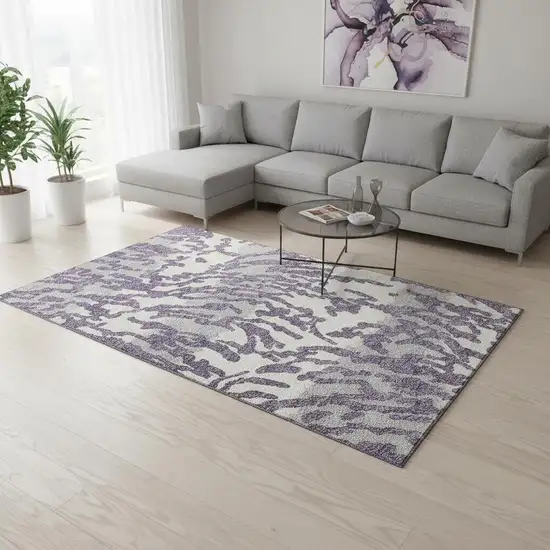 Purple And Ivory Animal Print Washable Area Rug With UV Protection Photo 2