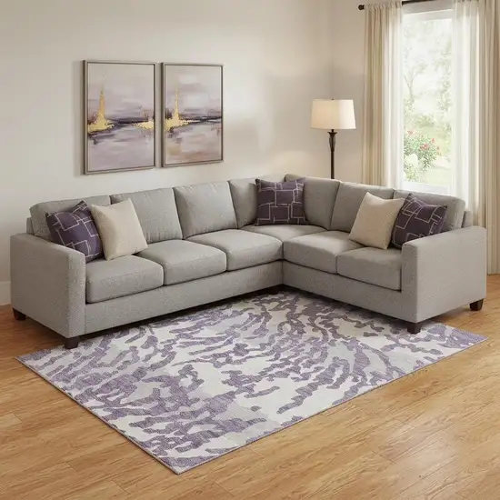 Purple And Ivory Animal Print Washable Area Rug With UV Protection Photo 1