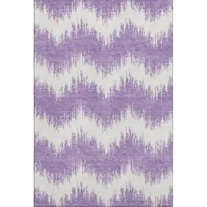 Photo of Purple And Ivory Chevron Washable Area Rug With UV Protection