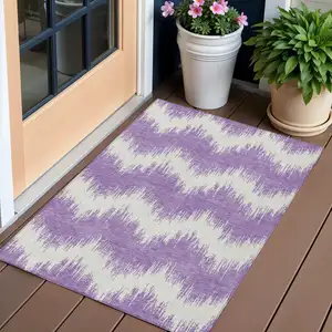 Photo of Purple And Ivory Chevron Washable Indoor Outdoor Area Rug