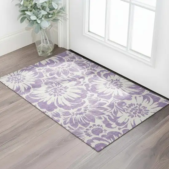 Purple And Ivory Floral Washable Area Rug With UV Protection Photo 1