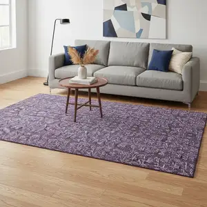 Photo of Purple And Ivory Floral Washable Area Rug With UV Protection