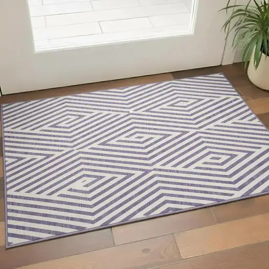 Purple And Ivory Geometric Washable Area Rug With UV Protection Photo 1