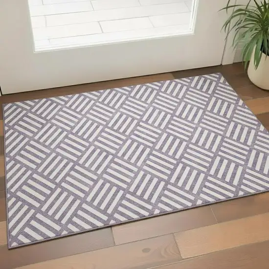 Purple And Ivory Geometric Washable Area Rug With UV Protection Photo 1