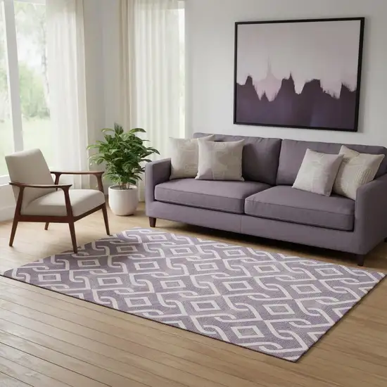 Purple And Ivory Geometric Washable Area Rug With UV Protection Photo 1