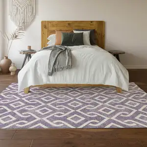 Photo of Purple And Ivory Geometric Washable Area Rug With UV Protection