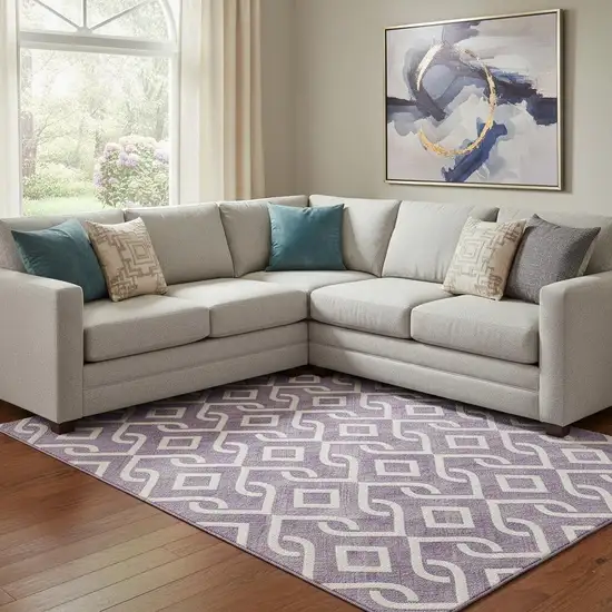 Purple And Ivory Geometric Washable Area Rug With UV Protection Photo 1