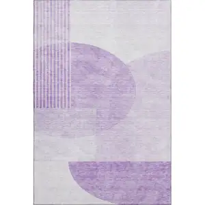 Photo of Purple And Ivory Geometric Washable Area Rug With UV Protection
