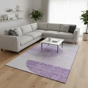 Photo of Purple And Ivory Geometric Washable Area Rug With UV Protection
