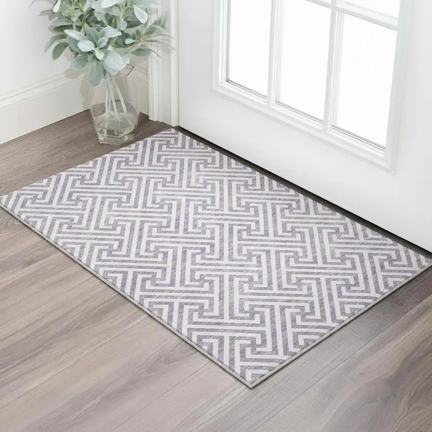 Purple And Ivory Geometric Washable Area Rug With UV Protection Photo 2