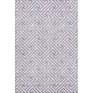 Photo of Purple And Ivory Geometric Washable Area Rug With UV Protection