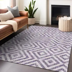 Photo of Purple And Ivory Geometric Washable Area Rug With UV Protection