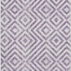 Photo of Purple And Ivory Geometric Washable Area Rug With UV Protection