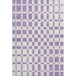 Photo of Purple And Ivory Geometric Washable Area Rug With UV Protection