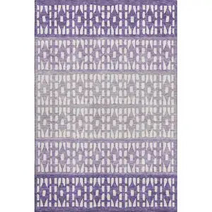 Photo of Purple And Ivory Geometric Washable Area Rug With UV Protection
