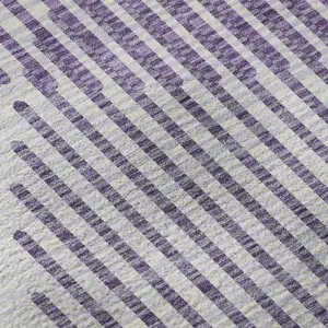 Photo of Purple And Ivory Geometric Washable Area Rug With UV Protection