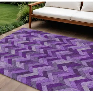 Photo of Purple And Ivory Geometric Washable Indoor Outdoor Area Rug
