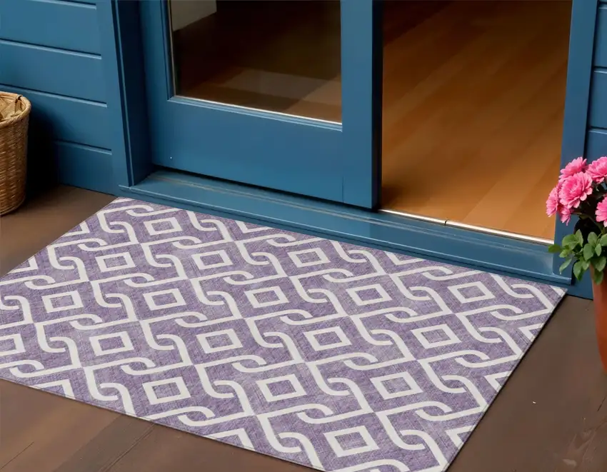 Purple And Ivory Geometric Washable Indoor Outdoor Area Rug Photo 1