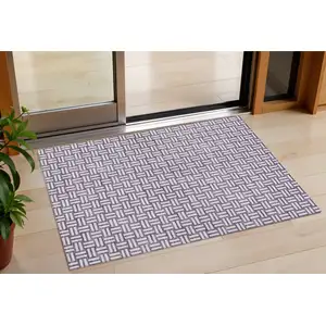 Photo of Purple And Ivory Geometric Washable Indoor Outdoor Area Rug