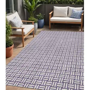 Photo of Purple And Ivory Geometric Washable Indoor Outdoor Area Rug