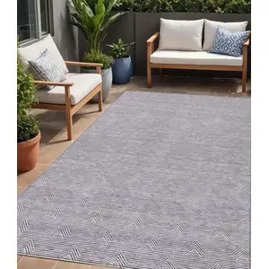 Photo of Purple And Ivory Geometric Washable Indoor Outdoor Area Rug