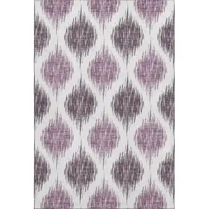Photo of Purple And Ivory Ikat Washable Area Rug With UV Protection