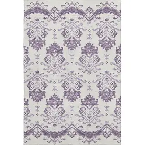 Photo of Purple And Ivory Medallion Washable Area Rug With UV Protection